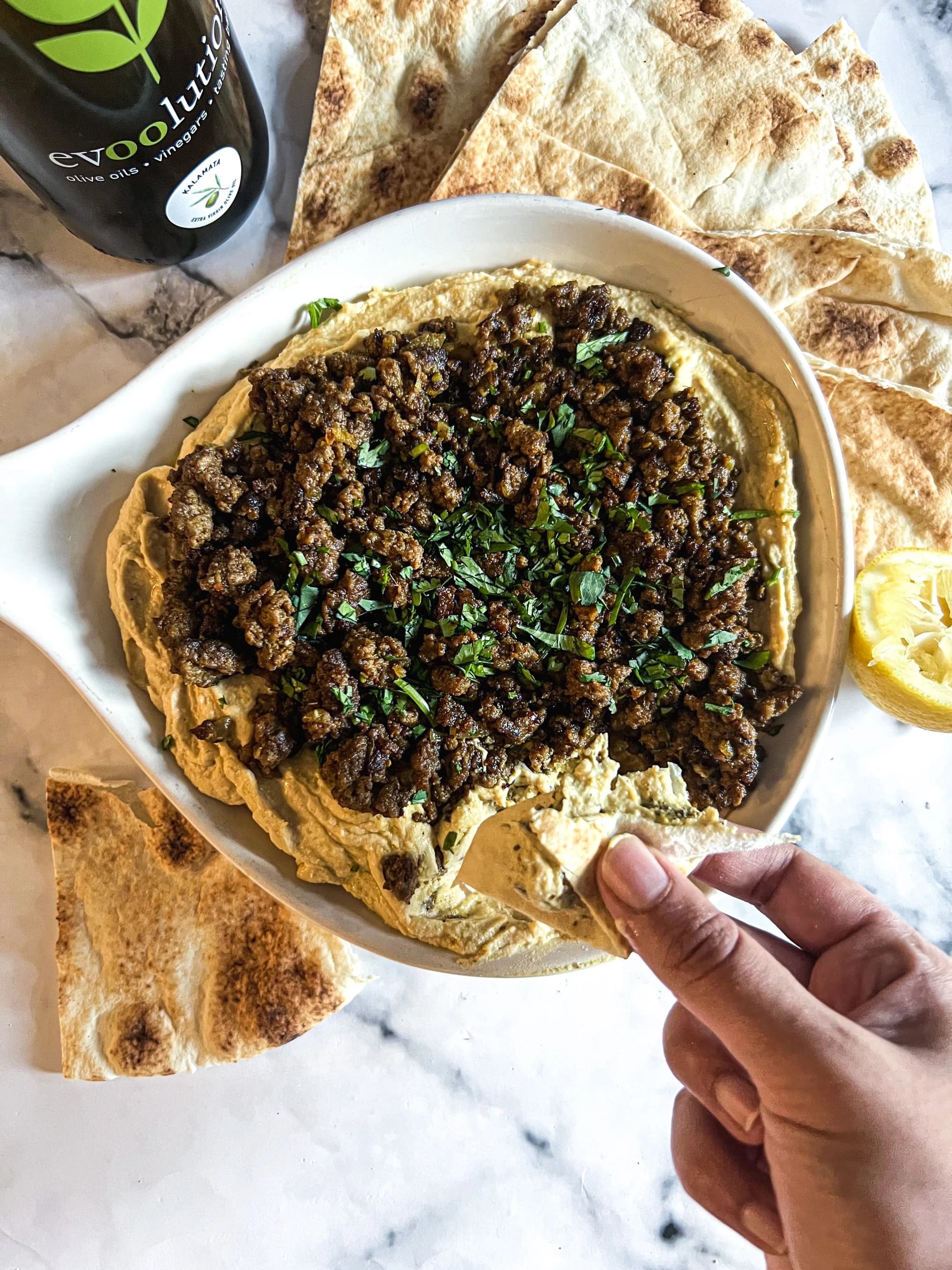 Shawarma spiced ground beef hummus