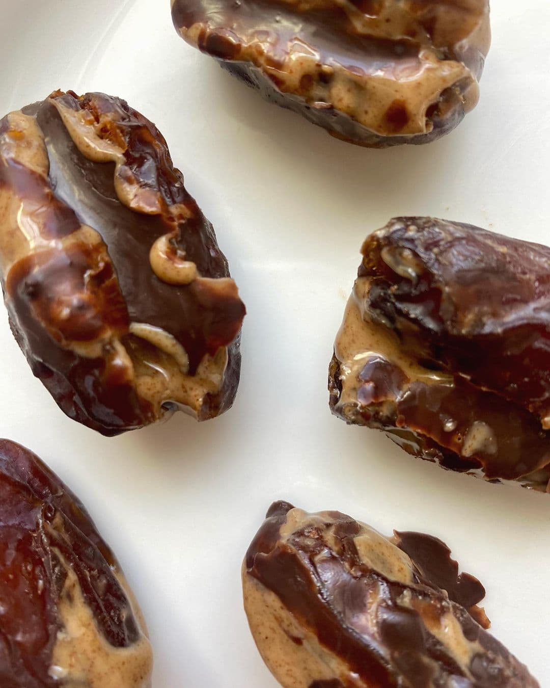 Peanut butter chocolate drizzled stuffed dates