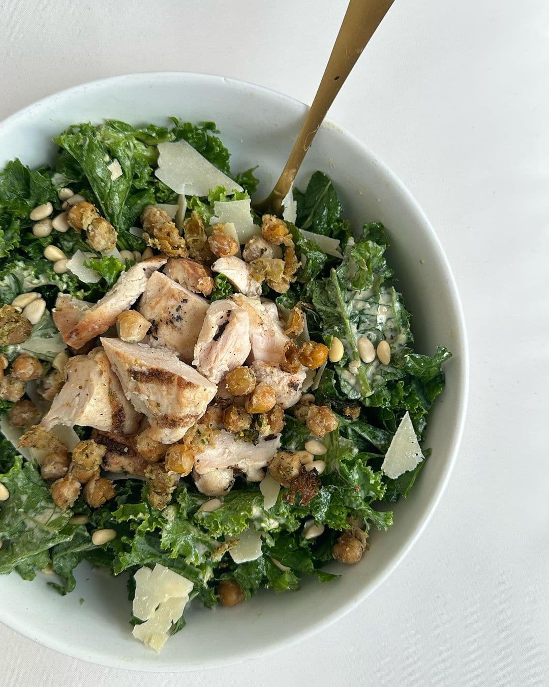Kale caesar salad with crispy chickpea “croutons”