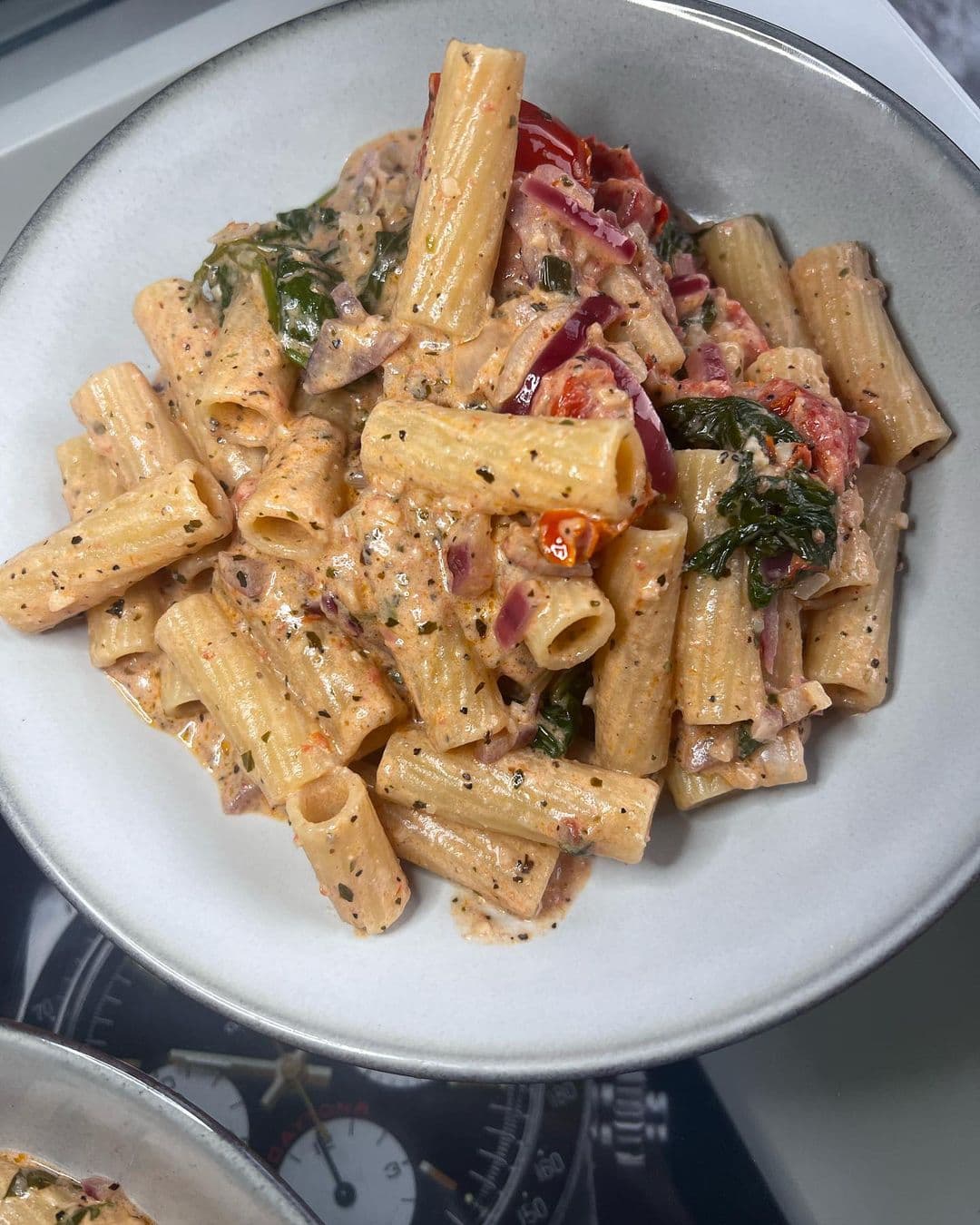 Creamy pancetta, spinach and tomato rigatoni